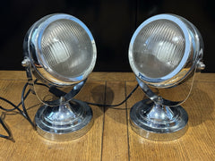 A Pair Of Adjustable Chrome Headlight Lamps