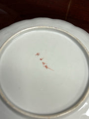 A Japanese Kutani charger signed Meiji period With A Smaller Plate