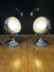 A Pair Of Adjustable Chrome Headlight Lamps