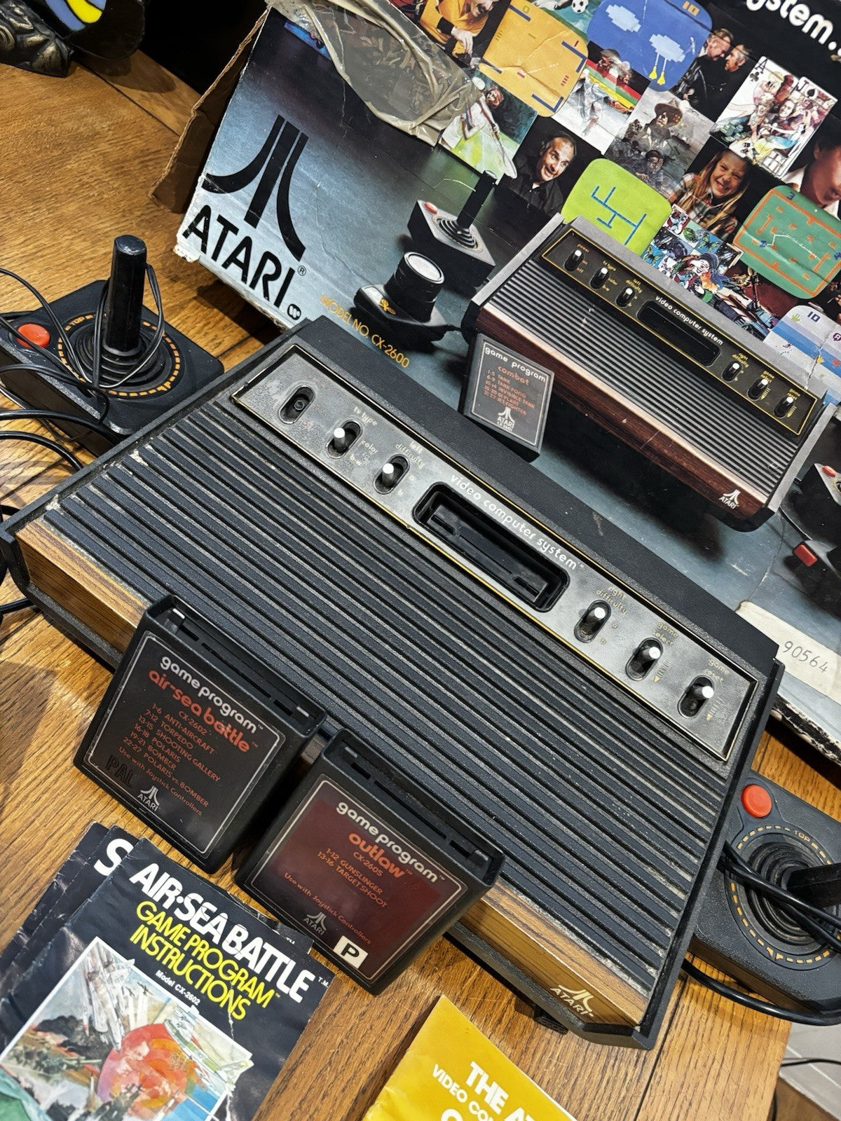 Atari 2600 With 2 joy sticks 2 paddles and 2 Games In Original Box