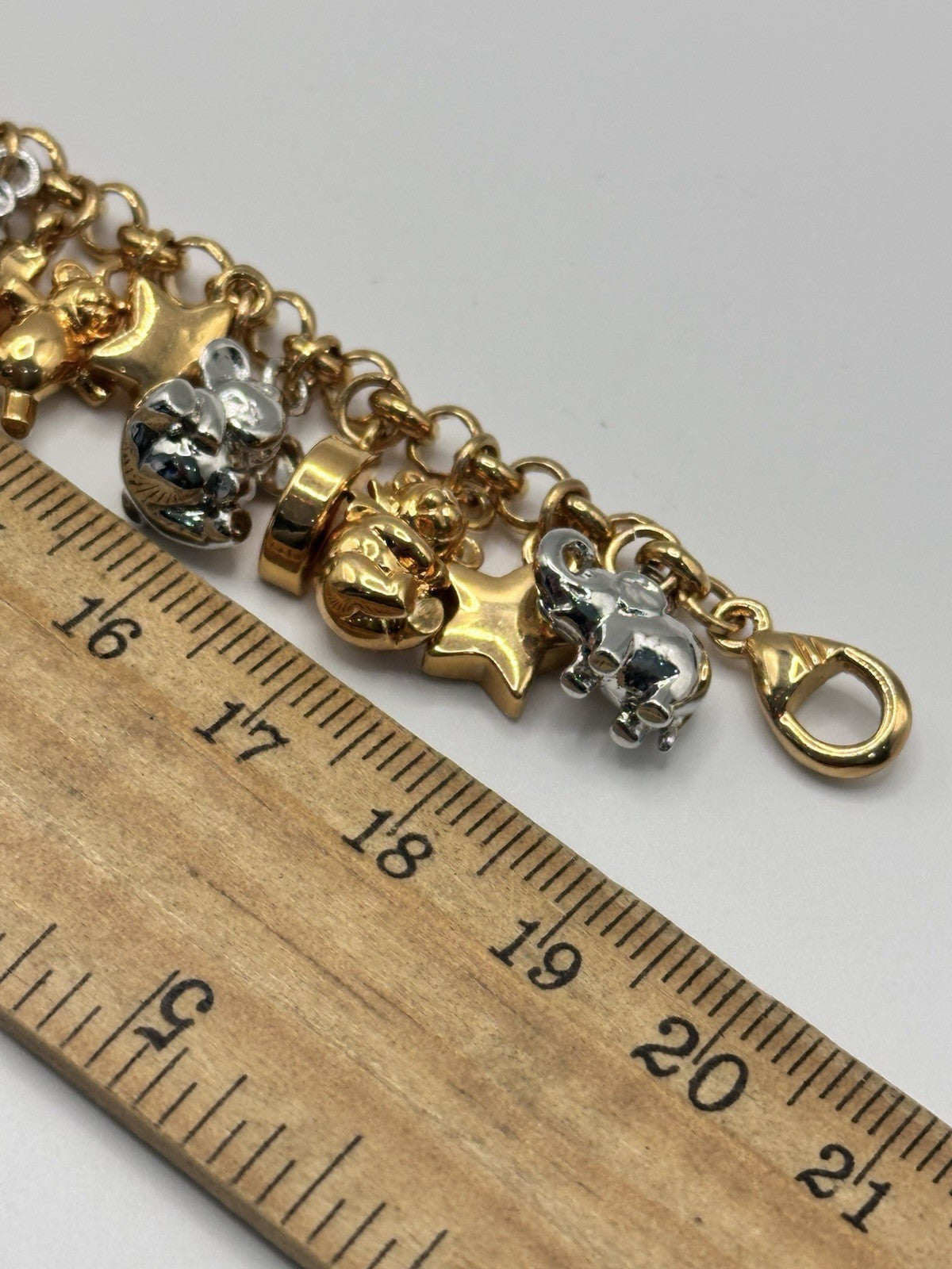 18ct Gold And Rhodium Plated Elephant Moon Stars Bears Charm Bracelet