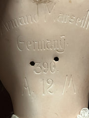 Armand Marseille bisque headed doll 390 with impressed marks to head, 68cm.