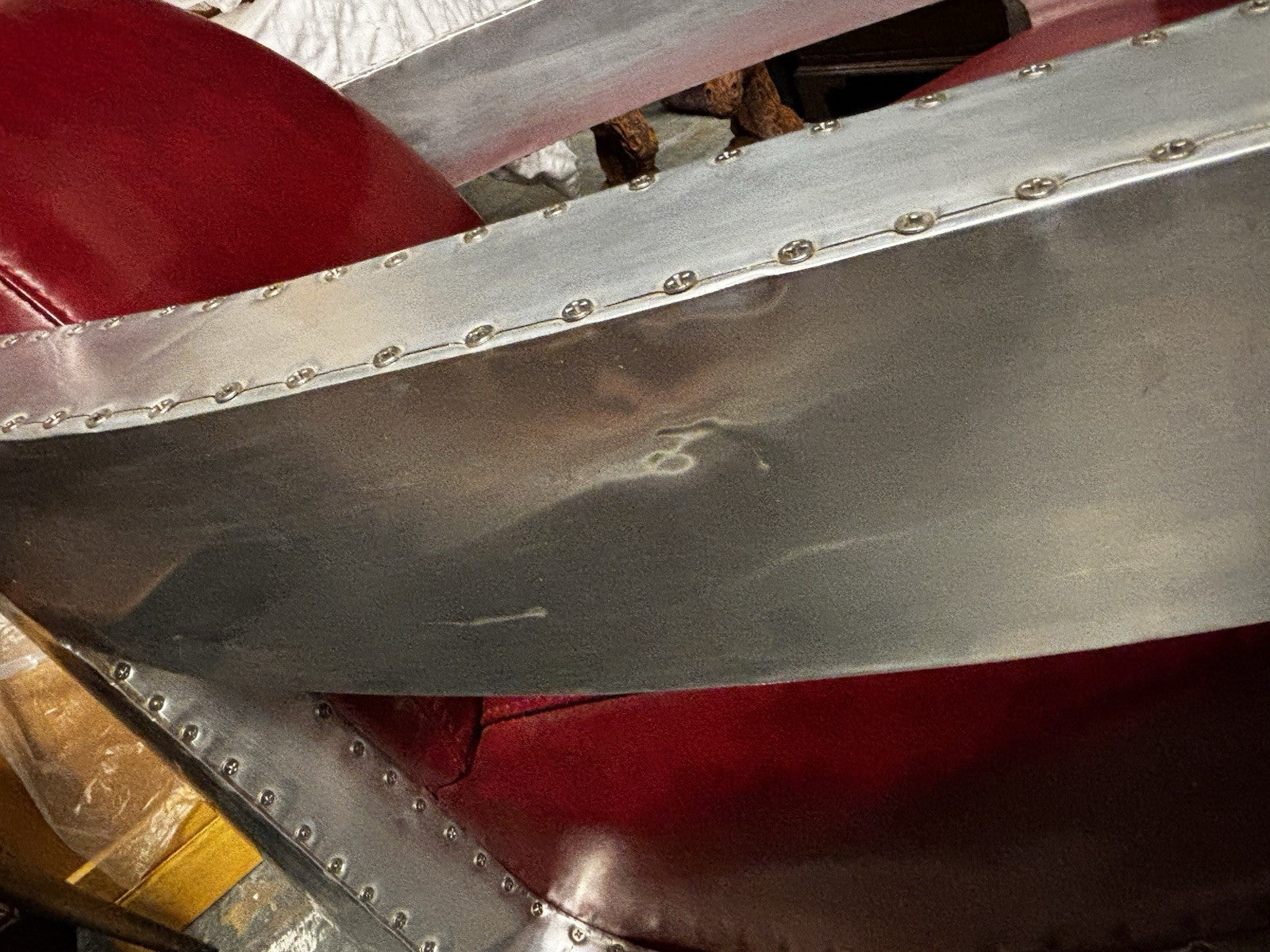 Aviators Polished Metal  Armchair, With Red Leather Upholstery.