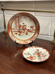 A Japanese Kutani charger signed Meiji period With A Smaller Plate
