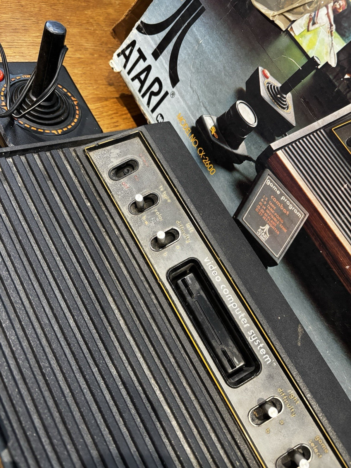 Atari 2600 With 2 joy sticks 2 paddles and 2 Games In Original Box