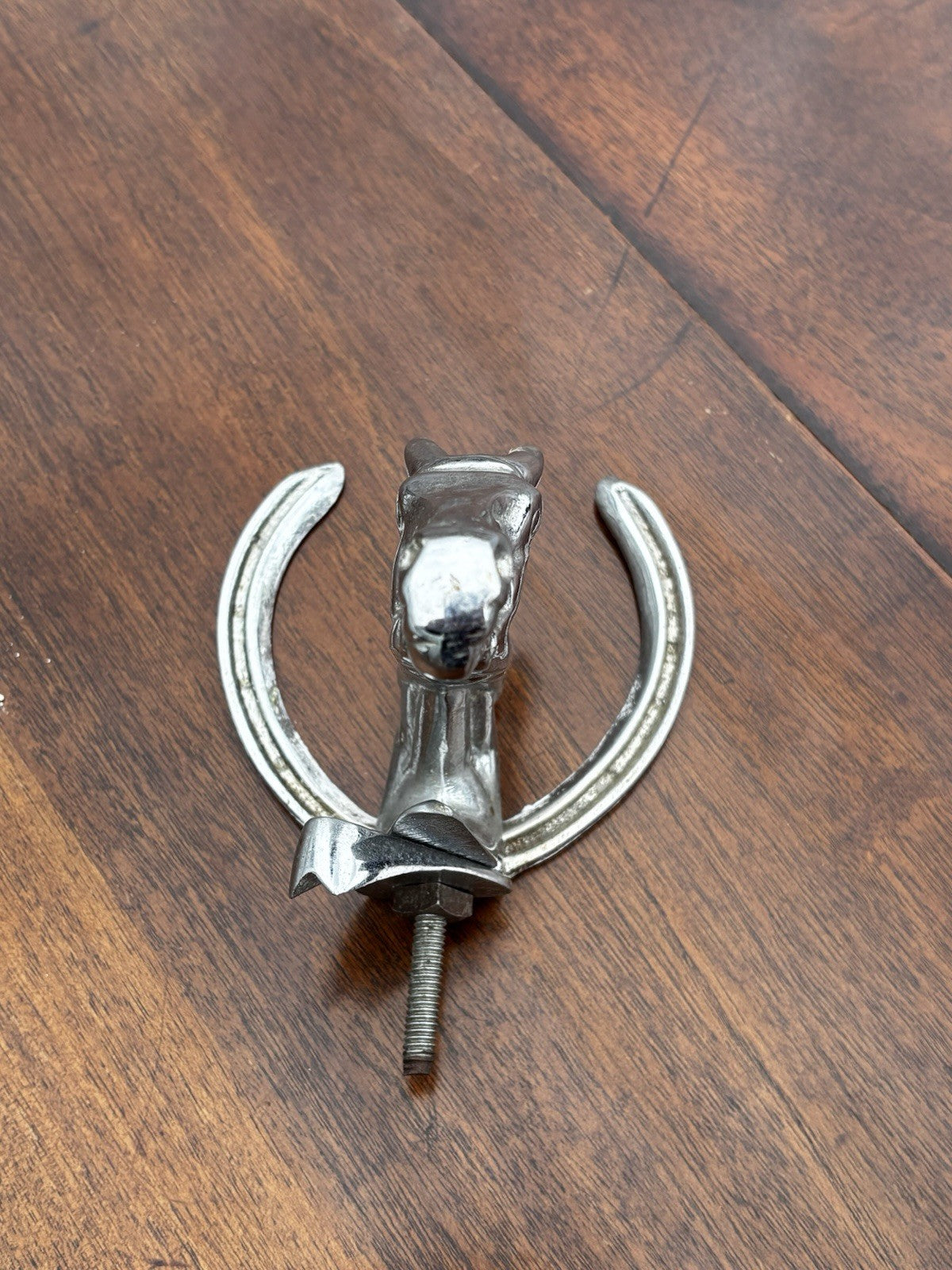 A Horse & Lucky Horse Shoe Car Mascot