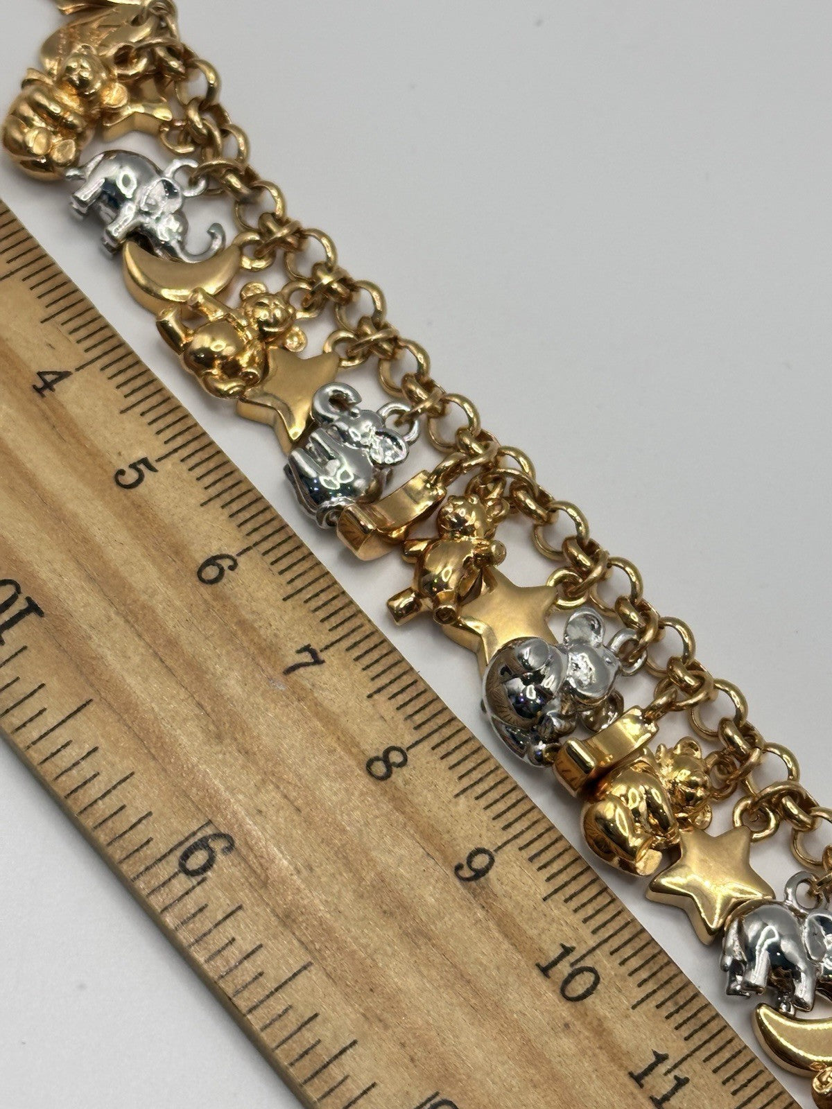 18ct Gold And Rhodium Plated Elephant Moon Stars Bears Charm Bracelet