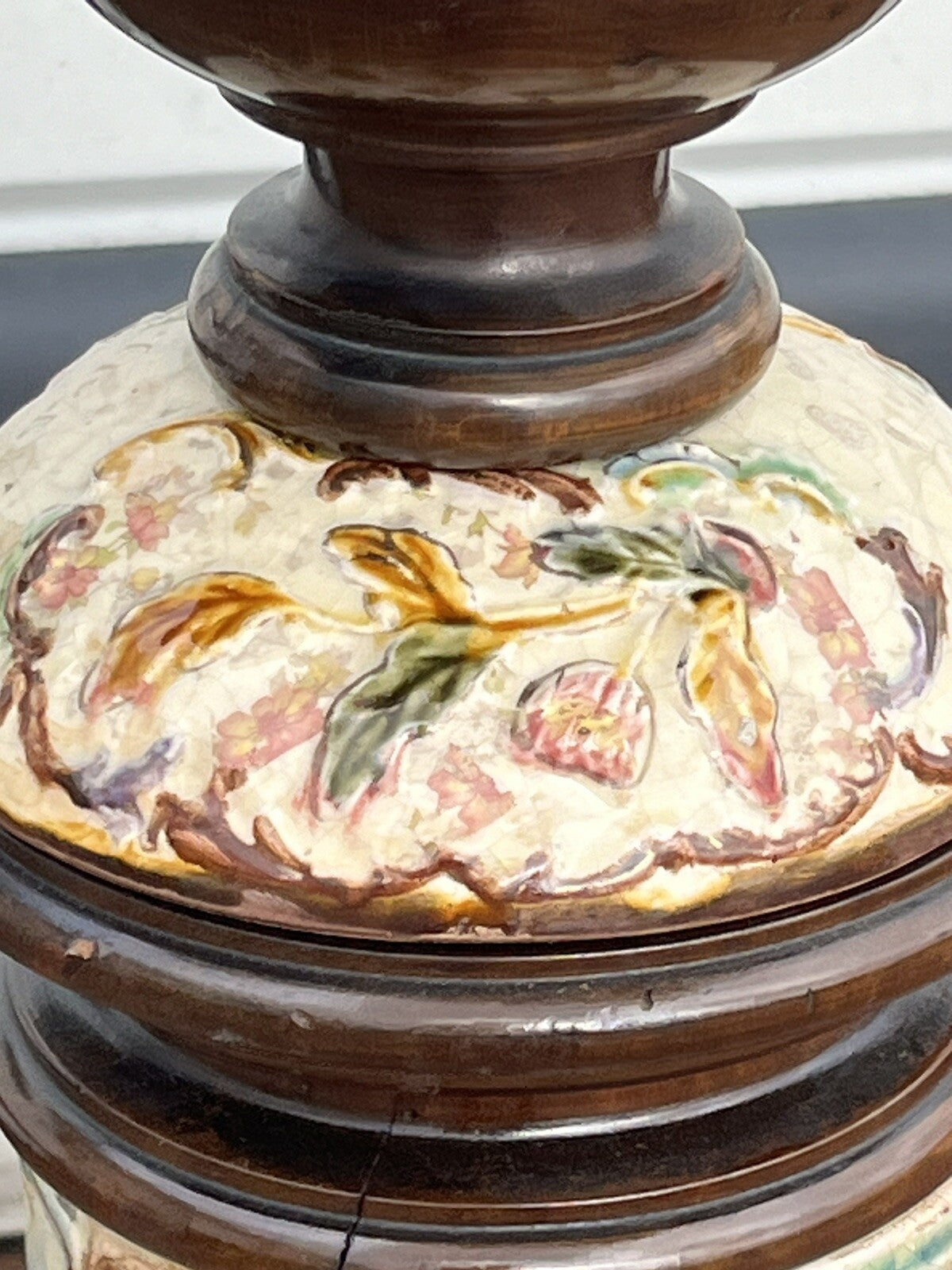Art Nouveau stand in earthenware and ebonised wood.