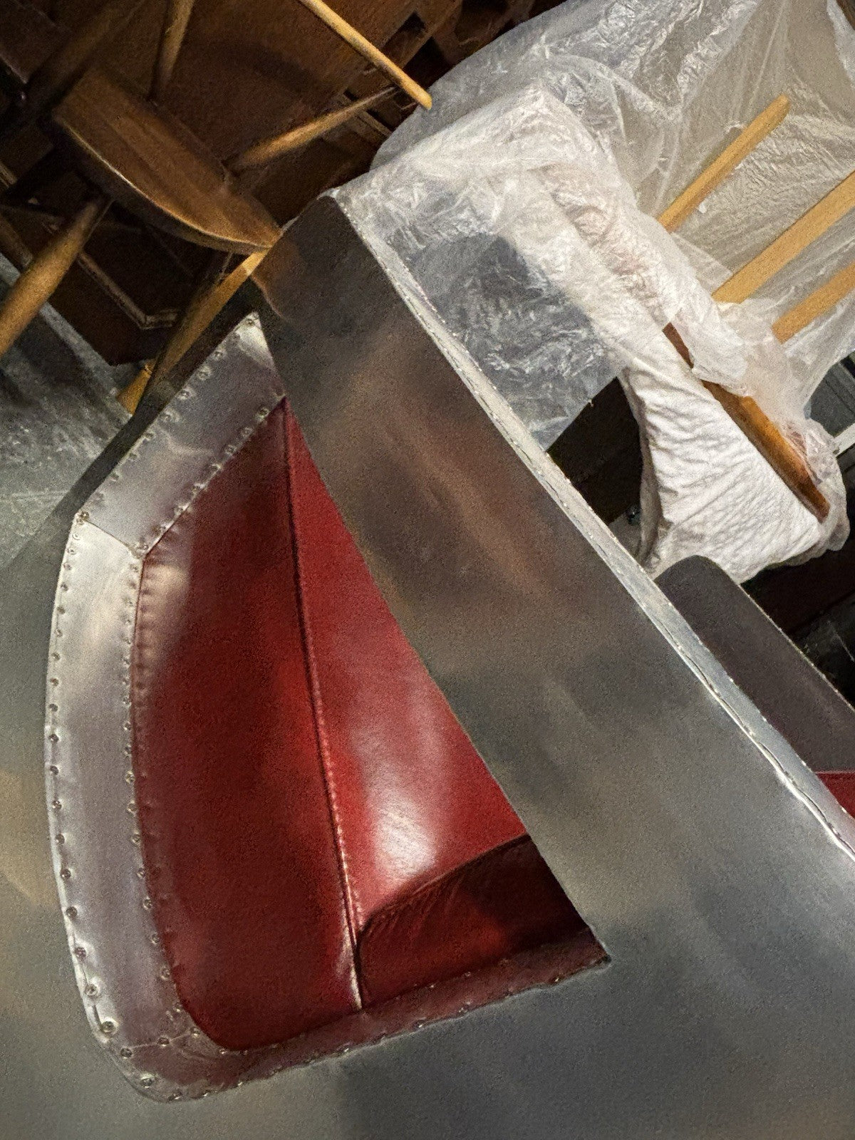 Aviators Polished Metal  Armchair, With Red Leather Upholstery.