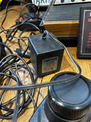 Atari 2600 With 2 joy sticks 2 paddles and 2 Games In Original Box