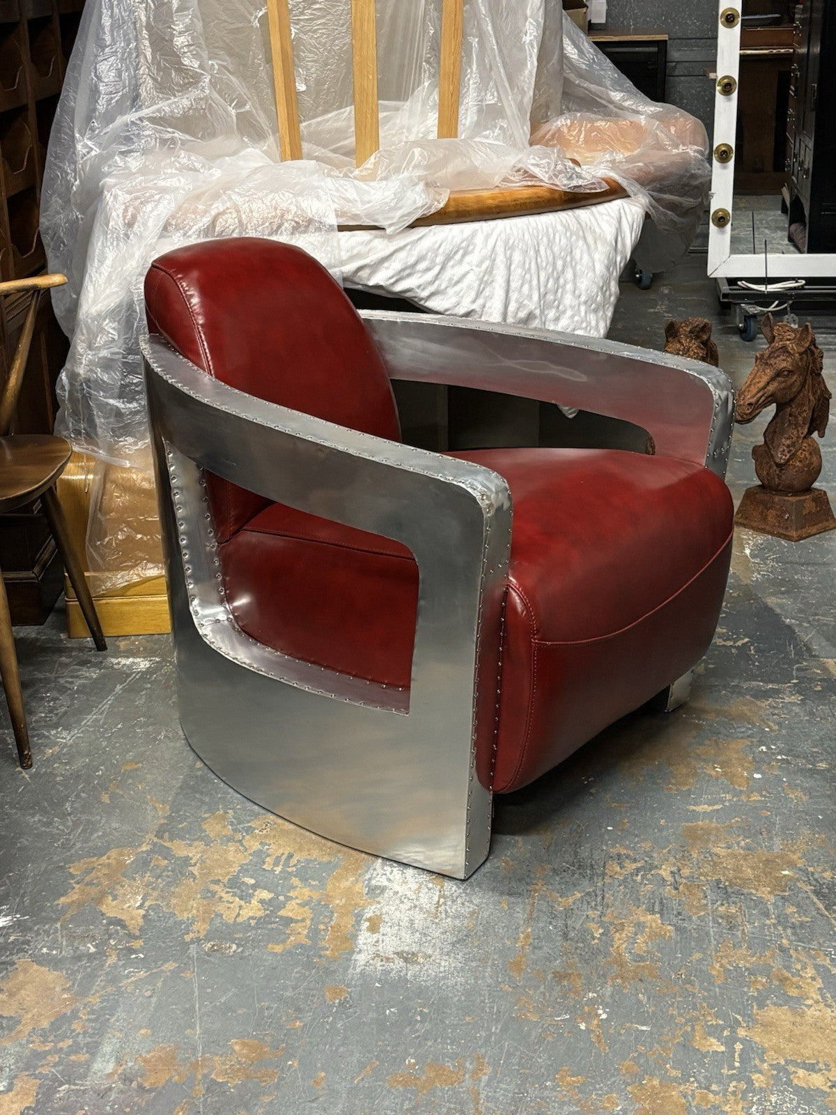 Aviators Polished Metal  Armchair, With Red Leather Upholstery.