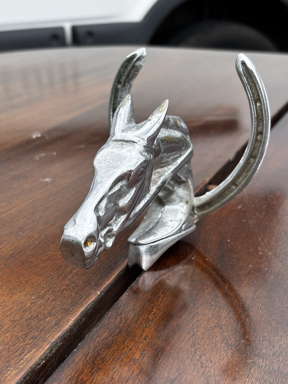 A Horse & Lucky Horse Shoe Car Mascot