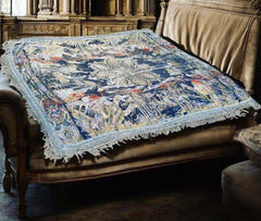 An early 20th Century large silk bed spread decorated with Middle Eastern scenes