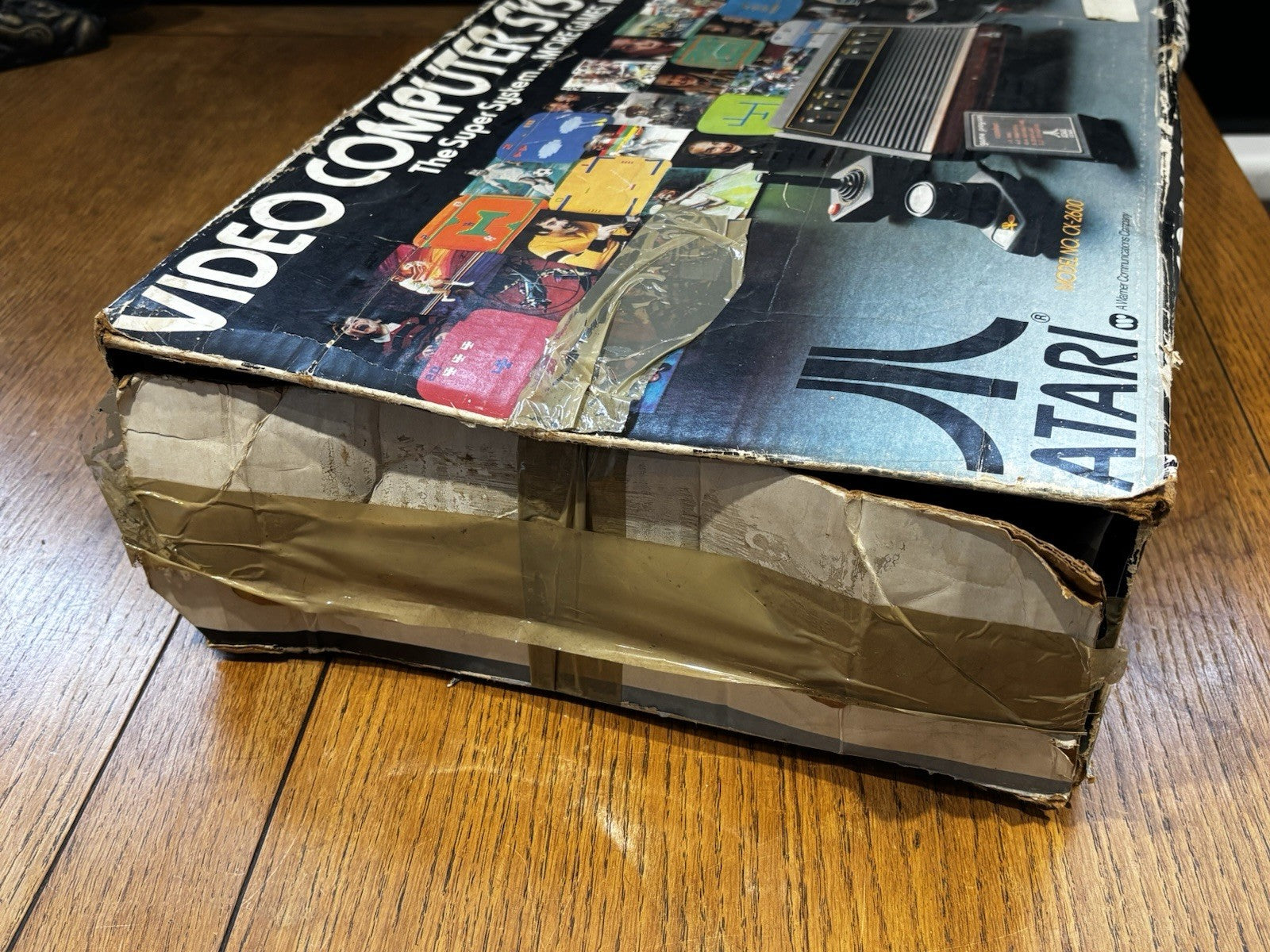 Atari 2600 With 2 joy sticks 2 paddles and 2 Games In Original Box