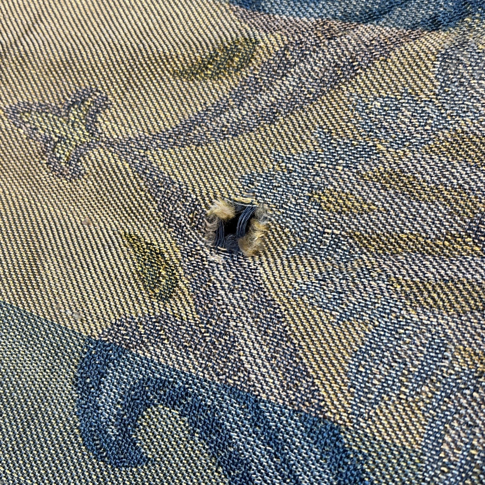 An early 20th Century large silk bed spread decorated with Middle Eastern scenes